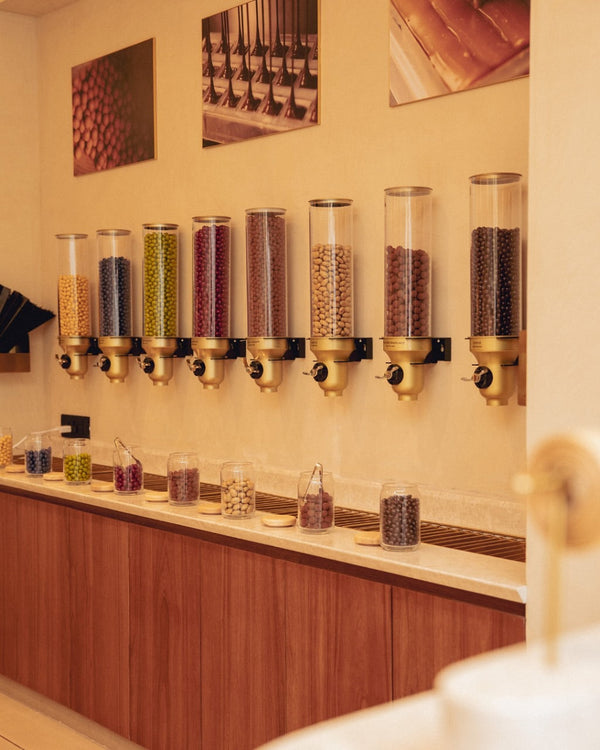 Retail Display Case Study: Entisi Chocolates - Scaling Luxury with Custom Gold Dispensers